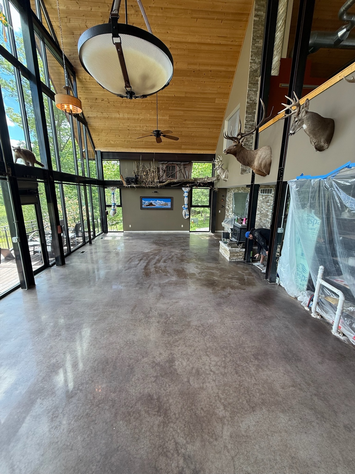 Decorative stained concrete floor in a spacious Des Moines lodge interior