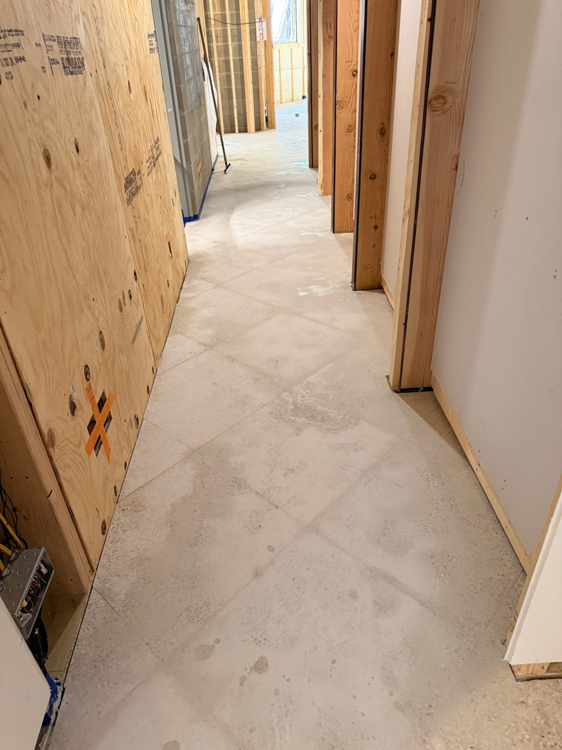 Prepared concrete hallway floor in a Des Moines building under construction